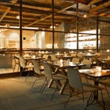 Hinoki & the Bird, Los Angeles <p><strong>At the curiously named</strong> but enchanting Hinoki & the Bird, executive chef Kuniko Yagi and chef-owner David Myers have allied to show the world what California cuisine has become this century—an amalgam of American-Pacific and Asian ideas melded with extraordinary finesse.</p>
<p>Myers's West Hollywood restaurant, Sona, shows a fastidious respect for Japanese food culture, and he has five restaurants in Tokyo. At Hinoki & the Bird, he has given Angelenos a spectacular two-level dining room with a ceiling of twisted cedar planes, a walnut stairwell, a copper-covered communal table, denim-covered seats, and a huge open kitchen. It's like a tree house for gourmands.</p>
<p>No dish is composed of more than three ingredients. Yagi marries seemingly incongruous flavors and textures with impeccable grace, making friends of unlikely ingredients like a culinary secretary of state. Ramen salad is jammed with succulent ginger-braised short ribs and spiced English peas. An outstanding beef tartare is finely chopped and barbed with jalapeño. Monkfish, it turns out, pairs beautifully with a lovely yellow-curry noodle and soft eggplant. I don't know which of the two is Hinoki and which the bird, but all you need to know is that together, Yagi and Myers are working some magic.</p>
<p><em>10 West Century Drive; 310-552-1200; <a href="http://www.hinokiandthebird.com/" target="_blank">hinokiandthebird.com</a></em></p>