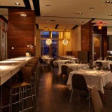 <p><strong>Quick:</strong> Name a great Italian restaurant in Miami. No? Okay, how about a real good one? Take your time. Nothing? Then here's news: MC Kitchen is not just the best and best-looking Italian restaurant in Miami; it's also one of the best in America.</p>

<p>The partners behind it—chef Dena Marino and Brandy Coletta—share more in common than iambic names. They both have impeccable taste and skill. Marino's repute comes from working with Michael Chiarello (see: Coqueta) and at <a href="http://www.esquire.com/features/food-drink/recommended-restaurants-1109#slide-1" target="_blank">Ajax Tavern</a> in Aspen. Coletta, a business developer, has a canny sense of south-Florida style, shown in a clean, stripped-down decor befitting MC Kitchen's Design District location. Gauzy curtains hang from a sixteen-foot ceiling, chrome and mirrors envelop the bar, and a white marble counter serves as a threshold to an open stainless-steel kitchen.</p>

<p>In that kitchen, Marino adapts Italian cuisine with gusto in dishes like pappardelle with spring ramps and "forever braised" pork ragù (which is as rich and luscious as you would imagine forever-braised pork to be). Miami being a hot town, she has a light touch with fish—try the juicy mahimahi with arugula, fennel, tiny Ligurian taggiasca olives, and sweet-orange vinaigrette. Her food and Coletta's savvy coalesce in a sophisticated balance rare in a city where glitz often trumps taste.</p>

<p><em>4141 Second Avenue NE; 305-456-9948; <a href="http://www.mckitchenmiami.com/" target="_blank">mckitchenmiami.com</a></em></p>