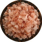 Himalayan Pink Salt <p>Though there are many pink salts out there on the market today, not all are created equal. Available in both coarse (pictured) and fine grinds, this variety from SaltWorks is an extremely dense salt, mined from ancient sea beds in the Himalayan mountain region. Because of it's density and intensely salty flavor, it is recommended that this salt be crushed down to your preferred size by hand (or put into a grinder) before using. The finer grind will dissolve evenly into soups, stews, and sauces, and so can easily be used in just about any dish in place of plain old table salt, but the coarser grind could be crushed manually to a larger size and used as a finishing salt — try a dash of it on top of an extremely sweet dessert, like a caramel or sticky pudding, to balance out the sugar.</p>
<p><a href="http://www.artisansalt.com/himalayan-pink.html" target="_blank">artisansalt.com</a></p>