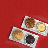 <p>If you want an easy way to offer your guests an array of desserts without the days of baking prep, considering ordering a mini pie sampler, like this one from Little Pie Company. You'll get Old Fashioned Apple, Key Lime, Mississippi Mud and Sour Cream Apple Walnut — a flavor to please every palate.</p>
<p><strong>Order here: <a href="http://www.littlepiecompany.com/Products/Little-Pie-Sampler__sampler.aspx" target="_blank">littlepiecompany.com</a></strong></p>