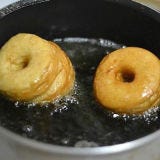 Like the original cronut, we fried ours in grapeseed oil at 350 degrees to get a golden brown outside and the inside perfectly cooked through. Don't crowd the fryer and leave enough room so that each cronut can be flipped over.