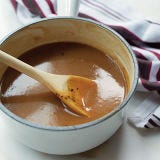 <p>If your whisk isn't working as well as you'd like it to, give your arm a break and switch tools. Use a medium weave strainer to run the gravy through. Smooth gravy will make it through to the serving boat but the lumps will get left behind.</p>
<p><strong>Recipe: <a href="http://gogonow.org/recipefinder/roasted-turkey-gravy-recipe-wdy1113%22 target="_blank">Roasted Turkey Gravy</a></strong></p>