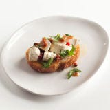 Mozzarella and Arugula Crostini Mozzarella and Arugula Crostini