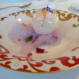<p>Topping the <a href="http://www.theworlds50best.com/list/1-50-winners/" target="_blank">chart of the world's best restaurants in 2013</a>, El Cellar de Can Roca is nearly impossible to get into. Joan, Josep, and Jordi Roca create whimsical dishes that are frequently inspired by different perfumes. This dish is the edible manifestation of Flower Bomb, a gelatin orb filled with flowers, ice cream, jelly, honey, cut lychees, violet and foam, all decorated with what head pastry chef Jordi Roca calls "a cloud of purple fairy floss."</p>
<p><strong>El Cellar de Can Roca:</strong> Can Sunyer 48, 17007 Girona; +34 972 22 21 57; <a href="http://www.cellercanroca.com/index.htm" target="_blank">cellarcanroca.com</a></p>