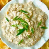 <p>This addictive snack is made with beer and for beer.

To make it: In 5-quart saucepot, melt 5 tablespoons butter and 1 tablespoon oil on medium. Add 3 large yellow onions, thinly sliced, 3 sprigs fresh thyme, and 2 teaspoons salt. Cook on medium 20 minutes or until onions are tender, stirring occasionally. Add 4 cloves garlic, finely chopped, and 1 cup beer. Cook another 25 minutes or until onions are meltingly soft, stirring occasionally. Increase heat to medium-high and cook 15 minutes or until golden brown, scraping bottom of pot occasionally. Let mixture cool slightly, then combine with 16 oz. sour cream, 1/4 c. mayonnaise, 2 teaspoons Worcestershire sauce, and 2 teaspoons red or white wine vinegar. Season to taste with salt and black pepper. Refrigerate, covered, at least 2 hours or up to 5 days. Makes about 4 cups.</p>