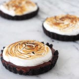 <p>It may be too cold for s'mores by the open fire, but this marshmallow concoction's sweet, crunchy shell bursting with bittersweet chocolate is sure to bring back warm summer memories.</p>
<p>Get the recipe at <a href="http://www.handletheheat.com/2013/06/chocolate-pudding-toasted-marshmallow-tarts.html" target="_blank">Handle the Heat</a>.</p>