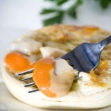 <p>It's only natural that Tasmania — an island located off of Australia's southern coast — would be famous for its seafood. Cool ocean currents in that part of the world create the perfect environment for a multitude of creatures, like crabs, lobster, oysters, abalone, and of course, scallops. Scallop pie is a savory pie much like a pot pie, found all across Tasmania, and has been a popular dish since the 19th century. The mild, creamy filling typically found inside a pot pie is usually spiced with curry, like this one from the <a href="http://tasmanianscalloppiecompany.com.au/" target="_blank">Tasmanian Scallop Pie Company</a>.</p>