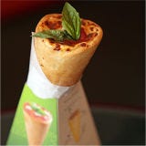 <p>No matter which pizza style you prefer — we're not getting into the Chicago deep-dish versus New York slice debate — neither is well suited to a suit-clad lunch hour. Kono Pizza wrapped theirs up so you can forget about grease stains and sauce spills and just enjoy your pizza. The Italian company even boasts six flavors from cult classics (simple pepperoni) to sit-down pizza joint staples (bianco).</p>