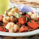 <p>Spruce up your everyday veggies by simmering them with a combination of lentils, vegetable broth, light coconut milk and red curry paste, then sprinkling with basil and cilantro.</p>
<p><strong>Recipe:</strong> <a href=" http://gogonow.org/recipefinder/spicy-thai-curried-lentils-recipe-121141%22 target="_blank"><strong>Spicy Thai Curried Lentils</strong></a></p>