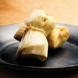 <p>Tamales are a sign of celebration at holiday gatherings in Mexican households on both sides of the border, especially for occasions like Christmas Eve or New Year's Eve dinner. Here we stuff them with creamy winter squash, black beans, and tangy goat cheese.</p><p><b>Recipe:</b> <a href="/recipefinder/squash-black-bean-goat-cheese-tamales-recipe"><b>Squash, Black Bean, and Goat Cheese Tamales</b></a></p>