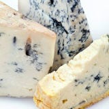 <p>This family of cheeses — made from cow's milk, goat's milk, and sheep's milk — is treated with molds to produce blue and green veins. Although blue cheeses typically have strong flavors that intensify with age, there are also a few that can be defined as relatively mellow. Their tastes can include a distinct sweetness that's often combined with the salty, sharp, and tangy notes that you'd expect from a blue.<p><br />

<p><b>Wine Recommendations</b></p>
<p><em>Dessert wines:</em> These sweet wines have intense flavors that aren't overpowered by strong blue cheeses. Try Fonesca Late Bottled Vintage 2000, Taylor Fladgate Special Ruby Porto, or Château Rieussex Sauternes.</p><br />
<p>Full-bodied and fruity California Zinfandels or Cabernets are also a great pairing option for the saltier blues. Try Rosenblum Zinfandel, Signoroello Zinfandel, Beaulieu Cabernet Sauvignon, or Joseph Phelps Cabernet Sauvignon</p><br />

<p><b>Suggested Recipes:</b><br />
<a href="/recipefinder/blue-cheese-spread-3512" target="_blank"><b>Blue Cheese Spread</b></a><br />
<a href="/recipefinder/fusilli-blue-cheese-toasted-walnuts-560" target="_blank"><b>Fusilli with Blue Cheese and Toasted Walnuts</b></a><br />
<a href="/recipefinder/blue-cheese-potato-cake-4273" target="_blank"><b>Blue Cheese Potato Cake</b></a></p>