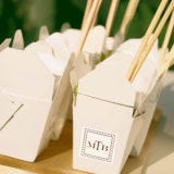 We love the idea of handing out take-out boxes (complete with your monogram!) for guests to fill up and take home. Package them ahead of time or let guests pick what they want from a dessert bar.