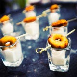 Serving up shot-size drinks with bite-size snacks is so hot right now. This couple paired mini <a href="/recipes/cooking-recipes/easy-doughnuts">doughnuts</a> with a shot of milk, but we've also seen it done with mini PB&Js, and even with small Oreos.