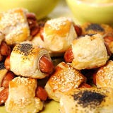 This tasty recipe for pigs in a blanket is a football party favorite. Housed in seeded puff pastry, these mini hot dogs will be irresistible to hungry football fans.
 Recipe: Pigs in a Blanket 