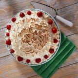 Baked Alaska <p>The name of this dessert was coined at <a href="http://www.delmonicosny.com/" target="_blank">Delmonico's Restaurant</a> in New York, NY in 1876. The restaurant decided to celebrate the purchase of the Alaska terrirory with a new dessert. Delighted dessert lovers have been enjoying the treat ever since.</p><br />
<p><b>Try These Homemade Recipes: </b><br />
<a href="/recipefinder/cherry-brownie-baked-alaska-3987"><b>Cherry-Brownie Baked Alaska</b></a><br />
<a href="/recipefinder/brownie-baked-alaska-1175"><b>Brownie Baked Alaska</b></a><br />
<a href="/recipefinder/minty-lime-baked-alaska-recipe-8375"><b>Minty Lime Baked Alaska</b></a><br />
<a href="/recipefinder/mini-chocolate-and-cherry-baked-alaskas"><b>Mini Chocolate and Cherry Baked Alaskas</b></a></p>