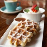 Belgian Waffles <p>This tasty treat was reportedly popularized in the U.S. at the 1964/1965 New York World's Fair by a vendor from Brussels, Belgium. The original form was served with whipped cream and strawberries.</p><br />
<p><b>Try These Homemade Recipes: </b><br />
<a href="/recipefinder/maple-belgian-waffles-recipe"><b>Maple Belgian Waffles</b></a><br />
<a href="/recipefinder/belgian-waffles-3910"><b>Classic Belgian Waffles</b></a></p>