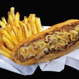 Philadelphia Cheesesteak <p>There's a simple reason "Cheesesteak" is preceeded by "Philadelphia" — that's where it was invented. The owner of <a href="http://www.patskingofsteaks.com/aboutus.html" target="_blank">Pat's King of Steaks</a>, Pat Olivieri, created the beloved steak sandwich in 1930. But cheese wasn't added until later. The history of the mouthwatering marriage between steak and cheese doesn't have a clear history. Some argue that <a href="http://www.genosteaks.com/" target="_blank">Geno's Steaks</a>, Pat's King of Steaks' rival (and neighbor) added the cheese in the 1960s. In that scenario, Pat's supposedly responded by putting cheese wiz on their steak sandwiches. Either way, Philadelphia citizens created a meal with staying power.</p><br />
<p><b>Try These Homemade Recipes: </b><br />
<a href="/recipes/cooking-recipes/philly-cheese-steaks"><b>Fantastic Philly Cheesesteak Recipes</b></a></p>