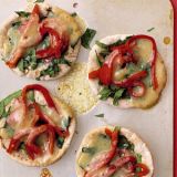 <p>Mini pizzas get a gold star for health when they're made with whole-wheat pitas, lots of fresh spinach and peppers, and just enough melted cheese.</p>  <p><b>Recipe:</b> <a href="http://www.delish.com/recipefinder/spinach-pepper-pita-pizzas-recipe-mslo0610" target="_blank"><b>Spinach and Pepper Pita Pizzas</b></a></p>