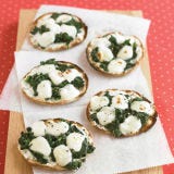 <p>Bocconcini are just bite-size morsels of fresh mozzarella. Look for them at specialty food stores and Italian markets, as well as many supermarkets; they're usually packaged in water or whey for freshness. Choose part-skim ricotta instead of regular; it has comparable creaminess, with fewer calories and less fat. Whole-wheat pitas are fiber-rich — and tasty. </p>
<p><strong>Recipe:</strong> <a href="../../../recipefinder/mini-spinach-cheese-pizzas-recipe-mslo0511" target="_blank"><strong>Mini Spinach-and-Cheese Pizzas</strong></a></p>