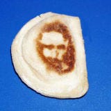 <b>Food:</b> Pierogi<br />
<b>Looks Like:</b> Jesus<br /><br />

While making a batch of pierogis on Easter Sunday, Donna Lee was shocked to find an image of Jesus staring back at her. In August 2005, the Point Place, OH, resident sold the pierogi for $1,775 on eBay. The winning bidder: Golden Palace Casino — the same place that purchased the Virgin Mary grilled cheese in 2004.<br /><br />

<a href="/search/fast_search_recipes?search_term=pierogi"><b>Find recipes for homemade pierogis.</b></a>