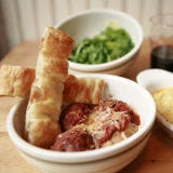 <p>What do we like best about meatballs and spaghetti? The meatballs of course! That's exactly what co-owners Dan Holzman and Michael Chernow thought when they conceived <a href="http://www.themeatballshop.com/" target="_blank">The Meatball Shop</a>, a popular downtown Manhattan restaurant. There diners feast on five varieties of meatballs from veggie to the specialty of the day all mixed and matched with a choice of sauces. One of their latest creations: The Reuben-Corned Beef ball with Swiss cheese, carraway seeds, Thousand Island dressing and sauerkraut. Finish it all off with an ice cream sandwich, also with customizable flavors for both the cookie and the ice cream.</p><p>The Meatball Shop is soon to be in two more outposts in New York City and with any luck they may be coming to a location near you.</p><br />
<b>Try these versions tonight:</b> <a href="/recipes/cooking-recipes/martha-stewart-best-meatball-recipes" target="_blank">9 of Martha Stewart's Best Meatball Recipes</a>.</p>