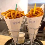 <p>In Belgium they don't need a hamburger to eat French fries. Nope, frites (as they call them) are the perfect snack to be savored at any time of day. But what really makes Belgian fries a favorite is the array of dipping sauces to dunk them in. At the newly opened <a href="http://www.eatfrites.com/" target="_blank">Saus</a> in Boston's amazing food Mecca, <a href="http://www.faneuilhallmarketplace.com/" target="_blank">Fanueil Hall</a> they offer everything from truffle ketchup to bacon parmesan to trick out your fry. The other half of Saus's menu is dedicated to Belgium's famed dessert: the waffle. Getting hungry for some fresh fries and hot waffles? So are we.</p>

<b>Try these recipes tonight:</b> <a href="/recipes/cooking-recipes/martha-stewart-perfect-fries-recipe" target="_blank">Martha Stewart's Perfect Fries</a>.</p><p><a href="/recipes/cooking-recipes/waffle-recipe" target="_blank">12 Irresistible Waffle Recipes</a></p>