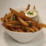 <p><b>Location:</b> New York, NY<br />
<b>Website:</b> <a href="http://www.theharrison.com/harrison.php" target="_blank">theharrison.com</a><br />
<b>On the Menu:</b> Schmaltz Fries with Malt Aioli</p><br />

<p>One type of frying isn't enough for these fries. At The Harrison, fries are blanched in a mix duck fat and chicken fat with canola oil. When they're ready for final cooking, they're dipped in sizzling hot canola oil. A simple salt topping gets them ready for a worthy accompaniment: malt aioli.</p>