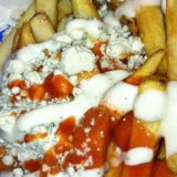 <p><b>Location:</b> Los Angeles, CA<br />
<b>Website:</b> <a href="http://www.freshfries.biz/" target="_blank">freshfries.biz</a><br />
<b>On the Menu:</b> Blue Buffalo</p><br />

<p>This food truck is all about the fries, and it's completely vegetarian. Terrific fries are served in a cone with your choice of seasonings and sauces, including chipotle ketchup, curry mayo, and artichoke basil mayo. One of the fave "fancy fies" on the menu is the Blue Buffalo (pictured): natural-cut fries topped with buffalo sauce, Bleu cheese crumbles, and Bleu cheese dressing.</p><br />

<p>Other awesome creations include: Curry Crazy (curry mayo, curry ketchup, and mango chutney); Peanut Buttercup (sweet potato fries with nutella and peanut butter); and Fiesta Fries (green chili guacamole with sour cream).</p>
