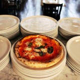 <p><b>Signature Item</b>: Pizza with brussels sprouts, smoked pancetta, mozzarella and garlic.<br />

Mathieu Palombino cooked at BLT Fish before he embarked on his pizza tasting tour, traveling from Italy to California, trying pies to perfect his bready, well-salted crust. Toppings vary at his two Motorino outposts—burrata with broccolini and sausage can be found at the original in Williamsburg in Brooklyn, while cherrystone clams with parsley butter are on offer at the second, in Manhattan's East Village. <a href="http://www.motorinopizza.com" target="_blank">motorinopizza.com</a>.</p>
