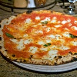 <p><b>Signature Item</b>: Margherita (with house-pulled mozzarella).<br />

Pizzeria Picco's wood-fired Neopolitan pies are rumored to be Mario Batali's favorite. Another draw: the quirky olive oil and sea salt soft serve ice cream. <a href="http://www.pizzeriapicco.com" target="_blank">pizzeriapicco.com</a>.</p>