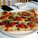 <p><b>Signature Item</b>: Margarita (with house-made pomodoro, fresh herbs, two cheeses and extra virgin olive oil).<br />

In 1980, Johanne Killeen and George Germon launched a new era of ambitious cooking in Providence with their thin-crusted grilled pizzas topped with superfresh ingredients. <a href="http://www.alforno.com" target="_blank">alforno.com</a>.</p>