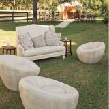 <p>You'll want to give people room to mingle easily, so don't crowd the room with chairs. Just provide enough seating so that your older guests have a comfy place to rest.</p><br /> 
<p><b>Top-Shelf Idea</b>: A combination of low chairs, coffee tables, and higher tables with bar stools will give your cocktail hour a different feel than your sit-down reception dinner. Want a cozier vibe? Build a virtual outdoor living room with overstuffed armchairs, rugs and vintage wooden end tables.
