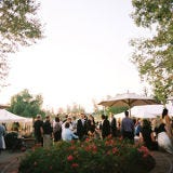 <p>Sure, you've spent ages planning out your reception decor — but don't let the cocktail hour go by the wayside, especially if it's in a separate space. Small centerpieces and extra votive candles can be a great way to finish off the room.</p><br />
<p><b>Top-Shelf Idea</b>: If your cocktail hour is outside, but your reception will be held inside a gorgeous ballroom, don't be afraid to vary the decor. Take advantage of the natural foliage and string wide ribbons and colorful banners with lights from the tree branches, or set up big floral installations near the entrance. Then tone things down inside your ballroom for an elegant, tasteful look.