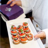 <p>We know it's your menu, but make sure it's diverse enough so that all of your guests will have at least one appetizer to enjoy. Hit up all the major tastes -- serve something slightly salty, sweet, bitter and savoryand provide several dishes that are complementary to your signature cocktails. Don't forget to ask about any special diets or allergies ahead of time to ensure everyone has something to enjoy.</p><br />
<p><b>Top-Shelf Idea</b></p>: Go ahead, give your guests something sweet before they sit down to dinner. You won't want to spoil their appetite for what's to come (so save the chocolate ganache for later), but offering a seasonally sweet treat — like a fruit tart or lemon sorbet could be the perfect palate cleanser before dinner. You can also go entirely forkless for your dinner, offering all bites on edible spoons or in mini crispy cones.
