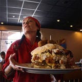 <p>In February, we reported on the Heart & Soul Café, a restaurant near Phoenix, AZ, that serves a massive breakfast. Just how massive? The dish, called "The Famous Suicide Stack," has four types of meat, two types of gravy, carbs, eggs, and cheese, and weighs in at over 15 pounds!</p><br />

<a href="/food/recalls-reviews/phoenix-cafe-serves-up-massive-breakfast-belly-bomb"><b>Read the Whole Story</b></a>