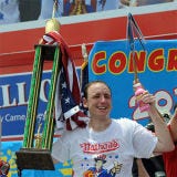 Joey Chestnut Won...Again <p>At he 96th Nathan's Famous Fourth of July Hot Dog Eating Contest, in Coney Island, NY, Joey "Jaws" Chestnut once again took first place, downing 54 hot dogs. But across the river on a Manhattan rooftop bar, Chestnut's typical competitor, Takeru Kobayashi — who was banned from the contest due to "contract disputes" — held his own contest against a live stream of the event at Coney Island. He reportedly ingested 69 hot dogs.</p><br />
<a href="/food/recalls-reviews/joey-chestnut-wins-nathans-hot-dog-eating-contest-2011-kobayashi-sets-world-record"><b>Read the Whole Story</b></a>