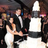 Kim Kardashian Planned $20K Wedding Cake <p>Reports that Kim Kardashian chose a $20,000 wedding cake for her nuptials made headlines in the days leading up to her wedding with Kris Humphries. The cake was designed by Los Angeles' Hansen's Cakes. It was a 10-tier white cake with chocolate-chip frosting. Unfortunately the marriage didn't make it to 2012, but we wonder if there's still a frozen top tier stashed in a freezer somewhere.</p><br />
<a href="/food/recalls-reviews/kim-kardashian-twenty-thousand-dollar-wedding-cake"><b>Read the Whole Story</b></a>