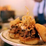 <p>Chef Frank Bonnano honed his skills during stints at The French Laundry and Gramercy Tavern, but he turns his attention to humbler dishes at <b>Lou’s Foodbar</b>. To make pulled pork sliders, Bonnano rubs pork shoulder with ginger, chipotle, and mustard; he then hickory smokes the meat for 12 hours and mounds it on top of slightly sweet house-made Portuguese buns. <i><a href="http://lousfoodbar.com/" target="_blank">lousfoodbar.com</a></i></p>