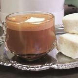 At her beautiful boutique, owner Kristen Hard makes amazing bean-to-bar chocolates and fun desserts like dark-chocolate-dipped frozen bananas. Hard infuses her superspicy dark-chocolate cocoa with six chiles and tops it with a fresh marshmallow.