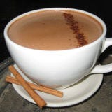 "We have lots of rich chocolate ganache all the time in the pastry kitchen, and our customers kept asking for hot chocolate," says Joanne Chang, pastry chef and owner of this relaxed bakery-café that has three locations in Boston. "So we scooped it into the espresso milk pitchers and steamed it with milk to make our signature hot chocolate. It's thick and rich and really delicious." The "fiery" version gets its spicy flavor from chile powder and cayenne pepper.