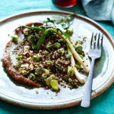 Quinoa Salad with Grilled Scallions, Favas, and Dates <p>This salad of grilled spring vegetables feels just filling enough, thanks to the protein-rich quinoa and a puree of dates that are grilled first to soften them and intensify their natural sweetness.</p><p><b>Recipe: </b><a href="http://gogonow.org/recipefinderquinoa-salad-grilled-scallions-favas-dates-recipe-fw0611%22 target="_blank"><b>Quinoa Salad with Grilled Scallions, Favas, and Dates</b></a></p>