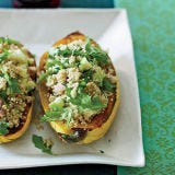 Quinoa is definitely a superfood: A grainlike seed, it's a "complete" protein containing all eight essential amino acids (another plus: it cooks much more quickly than most grains). To create a terrific vegetarian main course, <a href="/cooking-shows/celebrity-chefs/celeb-chef-michael-symon" target="_blank">chef Michael Symon</a> of Cleveland's <a href="http://www.lolabistro.com/" target="_blank">Lola</a> tosses quinoa with arugula, apple, raisins, and fresh herbs, then spoons the salad into a halved baked squash (a great source of iron and vitamins A and C).<br /><br /><b>Recipe: <a href="/recipefinder/roasted-delicata-squash-quinoa-salad-recipe" target="_blank">Roasted Delicata Squash with Quinoa Salad</a></b>
