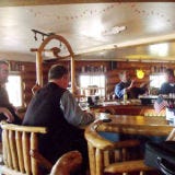 <p>Situated on a hill 42 miles northeast of Anchorage and a mere 6 miles from Wasilla proper, this rustic Alaskan biergarten is best known for hosting live polka band performances on the weekends and a killer panoramic view of the surrounding mountains from its outdoor patio.</p><p>The modest menu includes Bavarian-style items like a grilled bratwurst sandwich, a smoked pork loin sandwich, and the German Picnic, a platter loaded with salami, liverwurst, Swiss cheese, bread, German potato salad, and sauerkraut salad.</p><o>Locals gravitate to this place for its large selection of beers on tap, including Alaskan brands like Kodiak Nut Brown and Skilak Scottish Ale and German brews like Hefeweissen, Spaten, and Warsteiner. Regardless of possible cold and snow situations, Schwabenhof's is open year-round every day until 2 a.m. and 3 a.m. on Saturdays.</p><p><i>Mile 6.5 Palmer-Wasilla Hwy.; (907) 357-2739; <a href="http://www.matsunightout.com/bars/201793/schwabenhof" target="_blank">matsunightout.com/bars/201793/schwabenhof</a></i></p>
