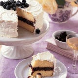 Filled with cassis-spiked blackberry jam and coated with lemon buttercream, our Lemon-Blackberry Cake will be a treat you'll want to share with the whole family: There will be enough slices to go around.<br /><br /><b>Recipes:</b> <a href="/recipefinder/lemon-blackberry-cake-3802"target="_new">Lemon-Blackberry Cake</a>, <a href="/recipefinder/blackberry-cassis-jam-3038"target="_new">Blackberry-Cassis Jam</a>, <a href="/recipefinder/lemon-buttercream-3330"target="_new">Lemon Buttercream</a>