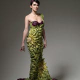 <b>Creator:</b> Photographer <a href="http://www.bing.com/search?q=Ted+Sabarese&qs=n&sk=&sc=8-12&form=delish" target="_blank">Ted Sabarese</a> with designers <a href="http://www.bing.com/search?q=Daniel+Feld+&qs=n&sk=&sc=8-12&form=delish" target="_blank">Daniel Feld</a> and <a href="http://www.bing.com/search?q=Wesley+Nault+&qs=n&sk=&sc=8-13&form=delish" target="_blank">Wesley Nault</a> of <a href="http://www.bing.com/tv/overview?q=Project+Runway+&seriesid=2CA029819A1147FF913102AFC6EA98CA&qpvt=Project+Runway+&FORM=delish" target="_blank"><i>Project Runway</i></a> fame<br /><b>Delicious Details:</b> In the name of art, this model stood for six hours as the designers sewed together each individual artichoke leaf covering her body. <br /><br /><b>Bing:</b> <a href="http://www.bing.com/videos/search?q=how+to+artichoke++&view=detail&mid=063A3347E2507D060023063A3347E2507D060023&first=0&FORM=delish" target="_blank">Watch how to properly eat an artichoke</a> <br /><b>Search:</b> <a href="http://www.bing.com/search?q=Artichoke+Health+Benefits&FORM=delish" target="_blank">Discover the health benefits of artichokes</a> <br /><br />Feeling inspired by artichokes? Try this recipe: <a href="/recipefinder/hot-artichoke-fontine-dip-rbk1207" target="_blank"><b>Hot Artichoke-Fontina Dip</b></a>