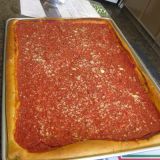 <b>The Place:</b> <a href="http://www.marchianosbakery.com/" target="_blank">Marchiano's Bakery</a>; Philadelphia, PA<br />
<b>The Pie:</b> You know Philly for its famous cheesesteaks, but the cheeseless tomato pie is another specialty hailing from the City of Brotherly Love. The best are found in Italian bakeries (not pizzerias) around Philly and its suburbs — even in Trenton, NJ — and one thing's for sure: It's all about the sauce. Marchiano's masters it, serving up a robustly flavored sauce atop a crust that's golden brown, as opposed to the sweet sauce and spongy dough found in other bakeries.