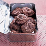 Storing Your Masterpieces <p>Air is the enemy when it comes to effectively preserving baked goods. Make sure to wrap and cover with care — improperly wrapped homemade baked goods will go stale quickly.</p>
<p><b>Special Tips for ...</b></p>
<p><b>Brownies and bar cookies:</b> Wrap securely with plastic wrap and then a second time with aluminum foil.</p>
<p><b>Cakes:</b> A proper cake plate with cover or cake carrier should be used when storing cakes, frosted or not.</p>
<p><b>Cookies:</b> Plastic storage containers with tight-fitting lids work best for cookies. Do not store crisp and soft cookies in the same container — the soft cookies will soften the crisp cookies. Storing soft cookies with a slice of bread will help keep them soft. (Change the bread slice every other day.)</p>
<p><b>Pictured Recipe:</b> <a href="/recipefinder/outrageous-chocolate-cookies-recipe" target="_blank"><b>Outrageous Chocolate Cookies</b></a></p>