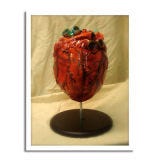 Heart-Shaped Cake <b>Bakery:</b> <a href="http://www.bing.com/search?q=Debbie+Does+Cakes+San+Francisco&qs=n&sk=&sc=1-31&form=delish"target="_blank">Debbie Does Cakes</a>, San Francisco, CA<br /><b>Cake Challenge:</b> A Halloween wedding. For the spooky sweethearts, baker Debbie Goard constructed an 18-inch-high red velvet cake with blood-red cream cheese frosting modeled after an anatomical heart. <br /><br /><b>Bing:</b> <a href="http://www.bing.com/images/search?q=anatomical+heart+cake&qpvt=anatomical+heart+cake&FORM=delish" target="_blank">See more ghoulish cakes</a> <br /><b>Search:</b> <a href="http://www.bing.com/search?q=how+to+make+a+cake+mold&qs=n&sk=&sc=2-23&form=delish" target="_blank">How to make a cake mold</a> <br /><b>Find:</b> <a href="http://gogonow.org/search/?q=halloween+cake" target="_blank">Halloween cake recipes</a>