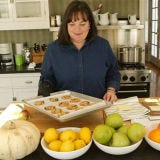<p>Ina Garten, better known as Food Network's Barefoot Contessa, grew up in Stamford, CT. Often pressured by her parents to concentrate on schoolwork, Ina didn't start cooking until her 20s. While vacationing in Paris with her husband, Jeffrey, Garten discovered her love of fresh, simple ingredients.</p><br /> 

<p>Back in the U.S. Garten moved to Washington, D.C., with Jeffrey, and while working on her MBA at George Washington University, she worked in the White House's Office of Management and Budget. Part of her job included writing for Presidents Gerald Ford and Jimmy Carter on nuclear energy policies -- a task Garten admits was kind of fun since her papers were being read by the president. Ultimately, though, Garten found the work uninspiring and sought a more creative career, one where she could be in charge and making the decisions.</p><br />
 
<p>A random ad in the <em>New York Times</em> for a specialty food store for sale in the Hamptons caught Garten's eye. She immediately fell in love and purchased the Barefoot Contessa shop on a whim, despite having no experience in the food business. But true to her convictions, Garten knew she had made the right decision.</p><br />

<p>Over the next 18 years, the Barefoot Contessa became a hotbed of culinary delights and was regarded as a highly praised resource for its wealthy and influential clientele. In 1996, Garten sold the Barefoot Contessa and began work on her first book, </em> <a href="http://search.barnesandnoble.com/Barefoot-Contessa-Cookbook/Ina-Garten/e/9780609602195/?itm=1" target="_blank"><em>The Barefoot Contessa Cookbook</em></a>. Outselling original projections, the cookbook caught the eye of Pacific Productions (the same production folks behind Nigella Lawson's shows), which led to her eponymous TV show, <em>Barefoot Contessa.</em></p>
