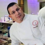 <p>Well, we know what wasn't part of Robert Irvine's background: getting knighted by the Queen, working on the wedding cake for Prince Charles and Princess Diana, owning a castle in Scotland, or serving as chef for several United States presidents. Irvine reportedly made false claims before being busted by the <a href="http://www.sptimes.com/2008/02/17/Southpinellas/TV_chef_spiced_up_his.shtml"target="_new">St. Petersburg Times</a>. An admitted "résumé exaggerator," Irvine got axed from his Food Network show <em>Dinner: Impossible</em> for deceiving the public and was replaced with Iron Chef Michael Symon.</p><br />
